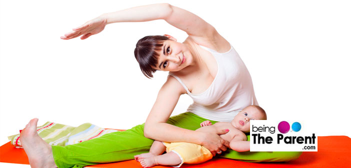 Mother exercising with baby