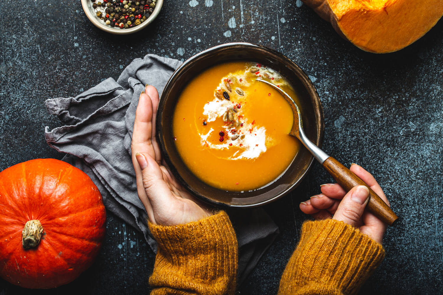 pregnant woman eating pumpkin soup