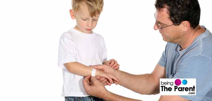 Toddler getting bandage