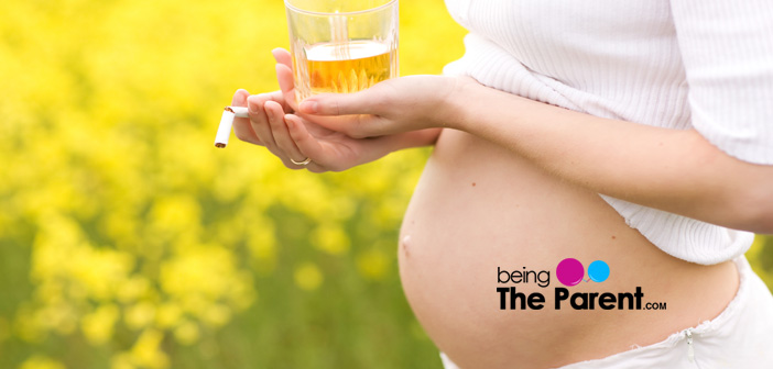 Pregnant woman drinking