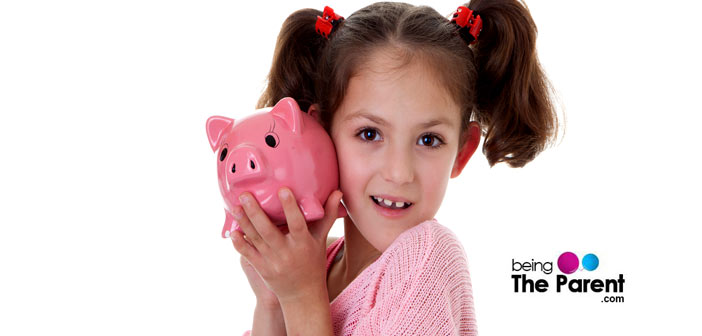 Happy Girl with piggy bank