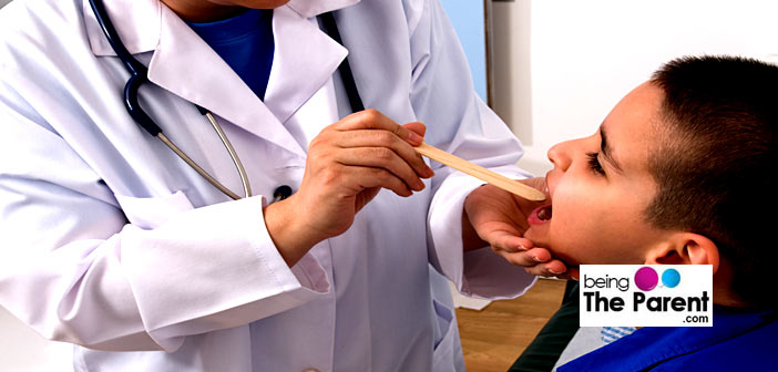  Doctor checking tonsils
