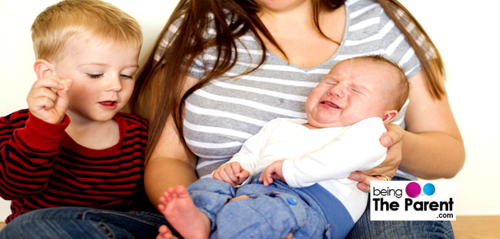 Handling newborn and toddler