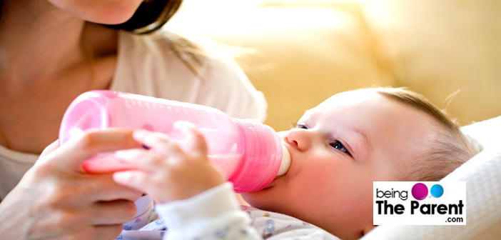 Happy baby feeding