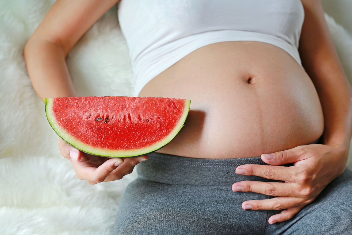 pregnant woman with water melon