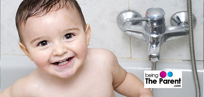 Happy toddler bathing