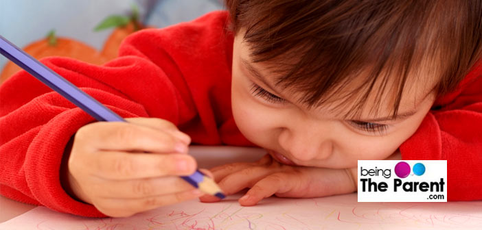 Little girl scribbling