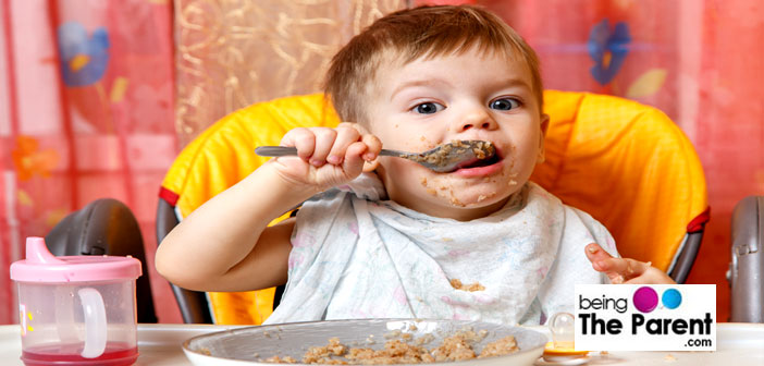 Baby boy eating food