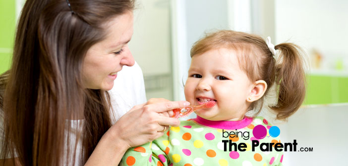 Teaching toddler brushing