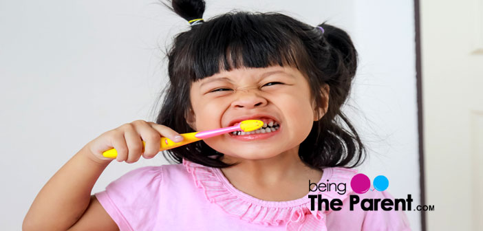 Toddler brushing teeth