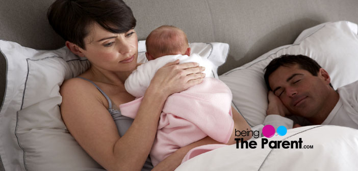 Wife comforts baby