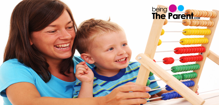 Mom and child using abacus