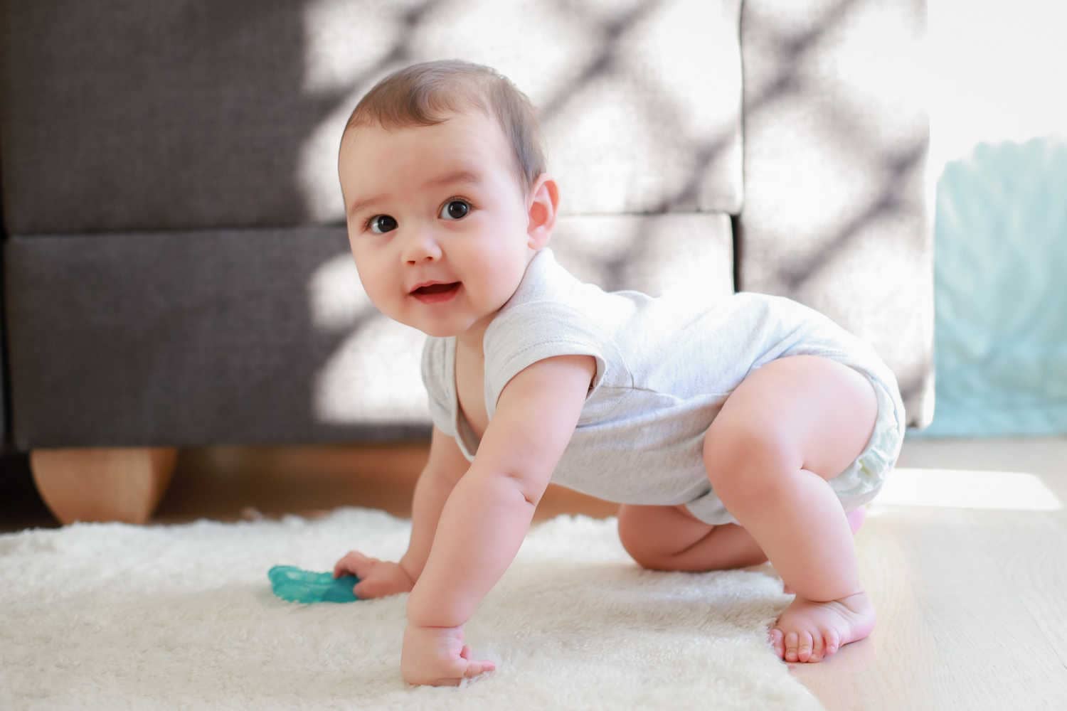 Why does my baby crawl backwards being the parent