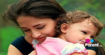 Want A Healthier And Happier Child? Start With A Hug! mom hugging child