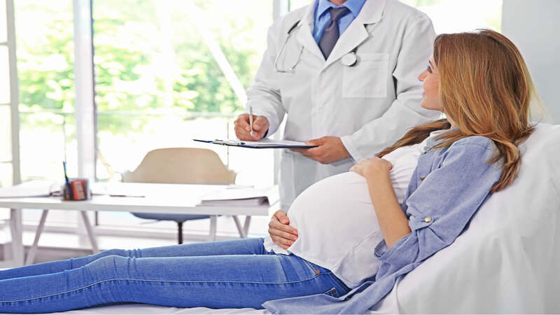 pregnant women with doctor