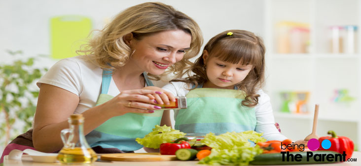 mother daughter making sala