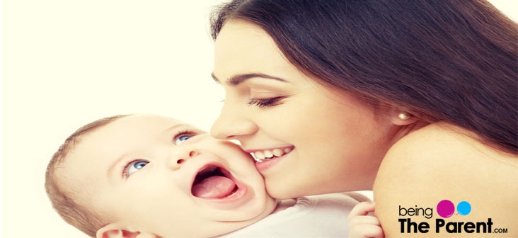 mother hugging baby