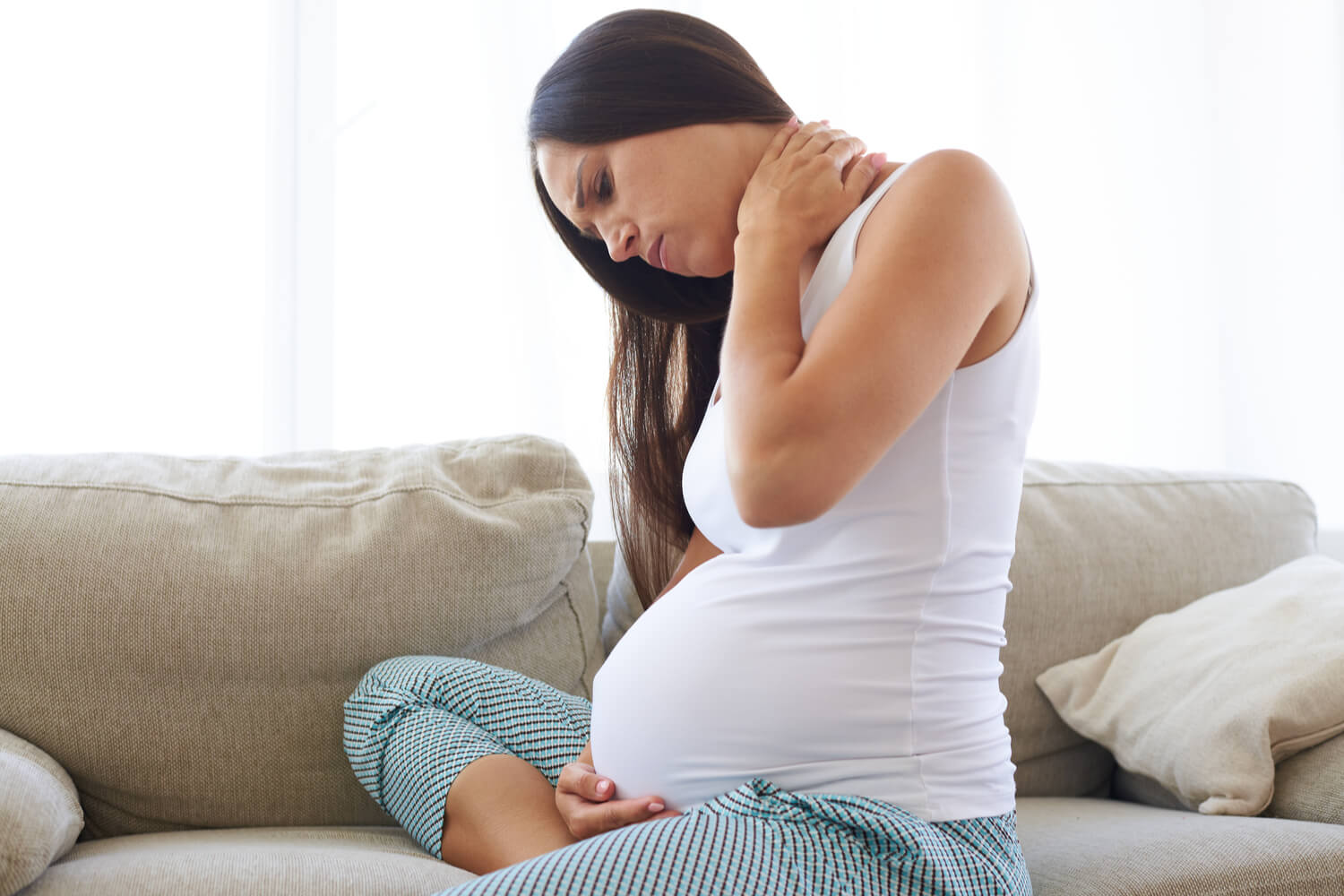 8 Ways To Prevent Neck Pain During Pregnancy - Being The Parent