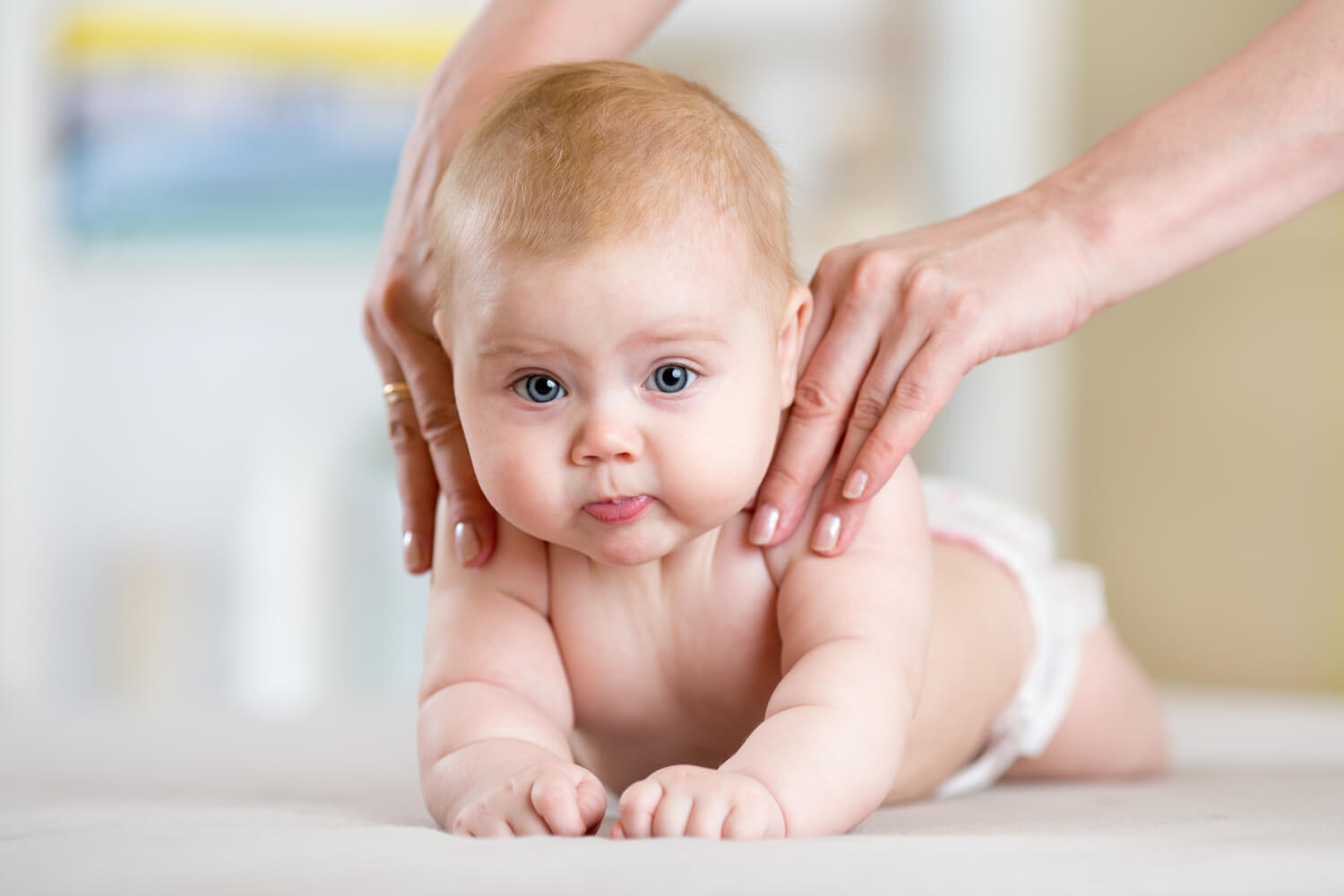infant getting massage