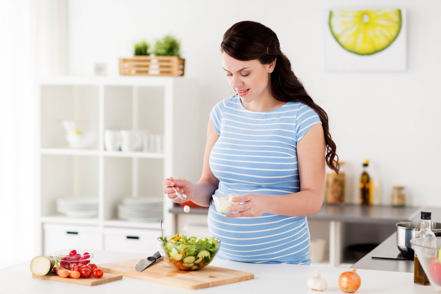 pregnant women preparing tofu salad