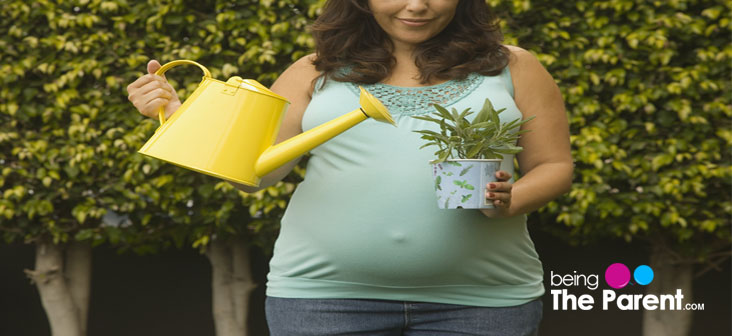 pregnant woman gardening