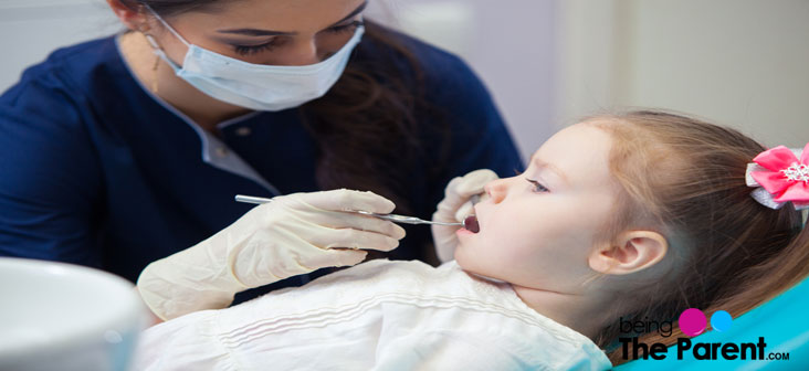 toddler with dentist