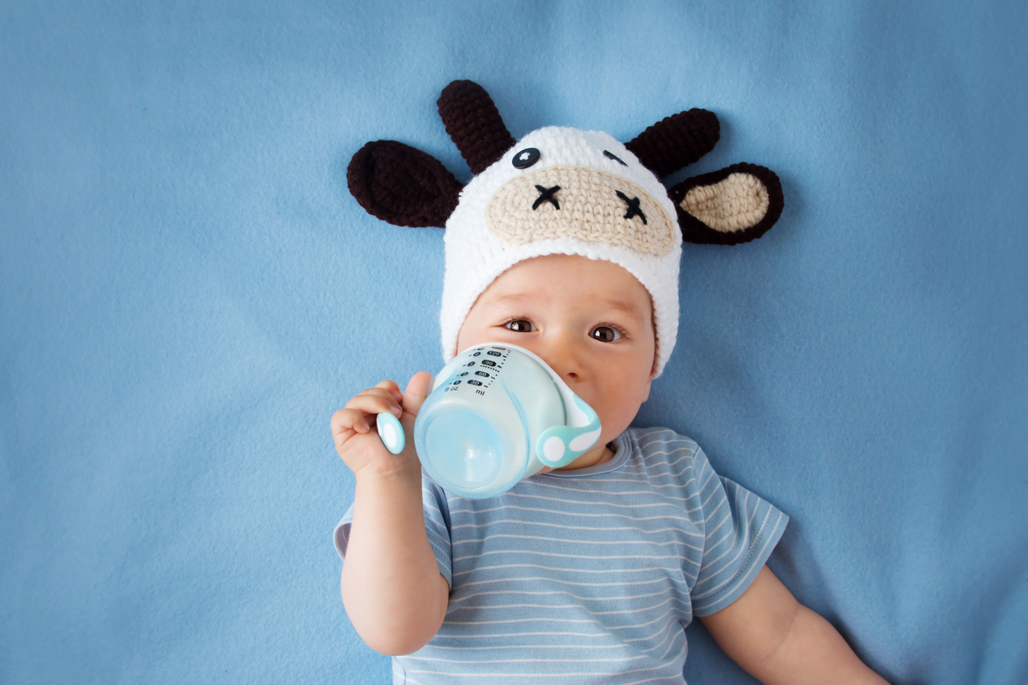 baby drinking from cup