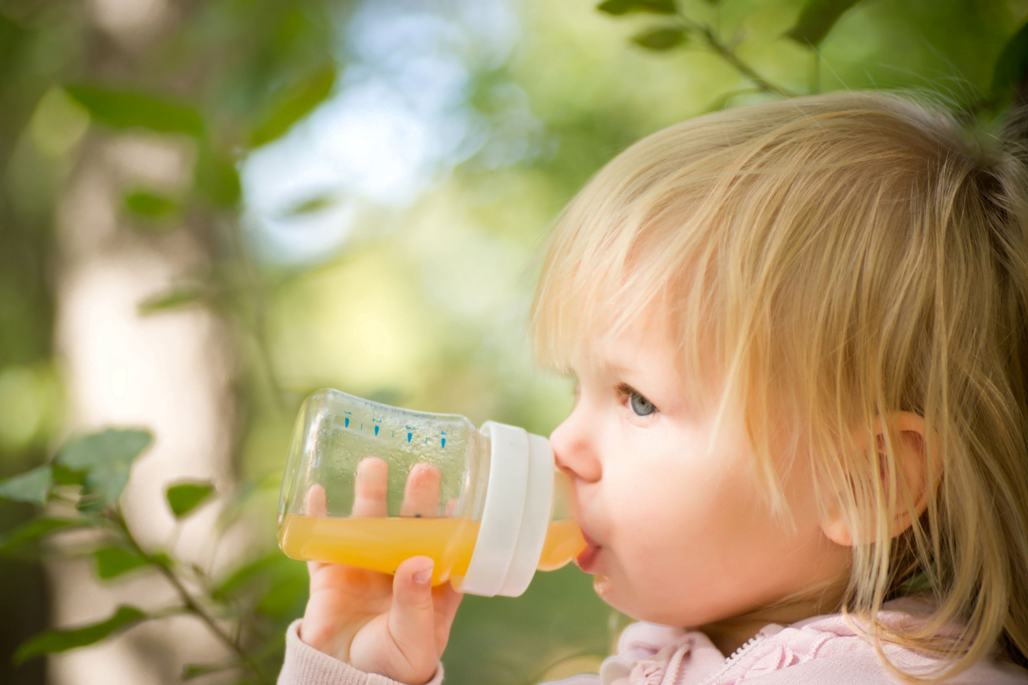 baby drinking juice