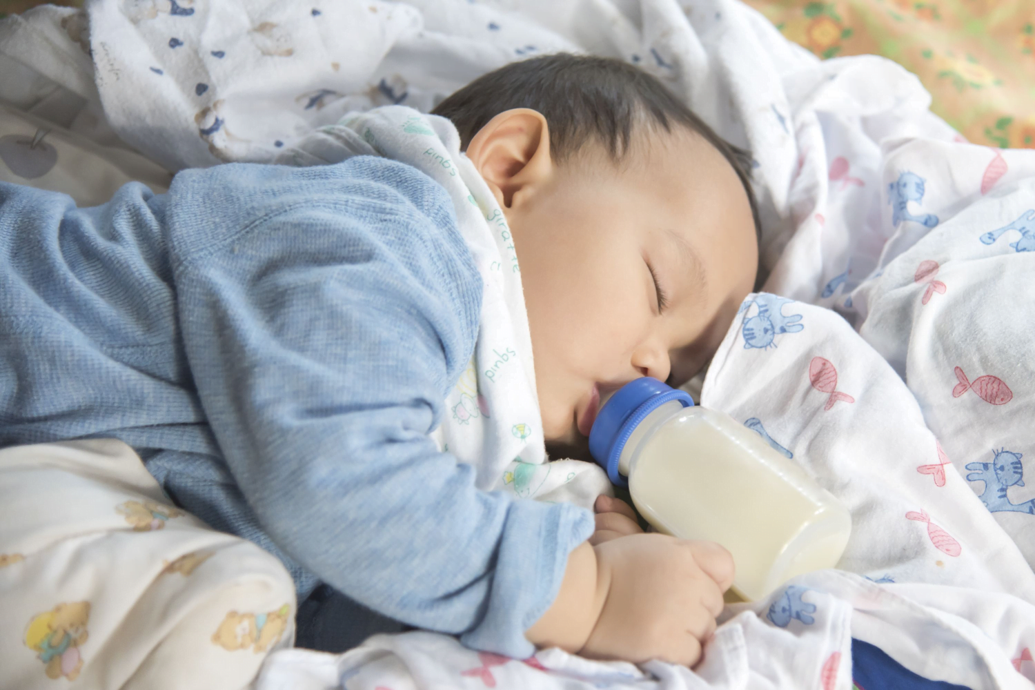 baby sleeping drinking
