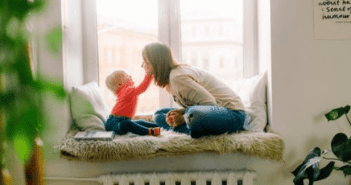 How to Make Your Home Perfect for Your Incoming Newborn mother playing with baby