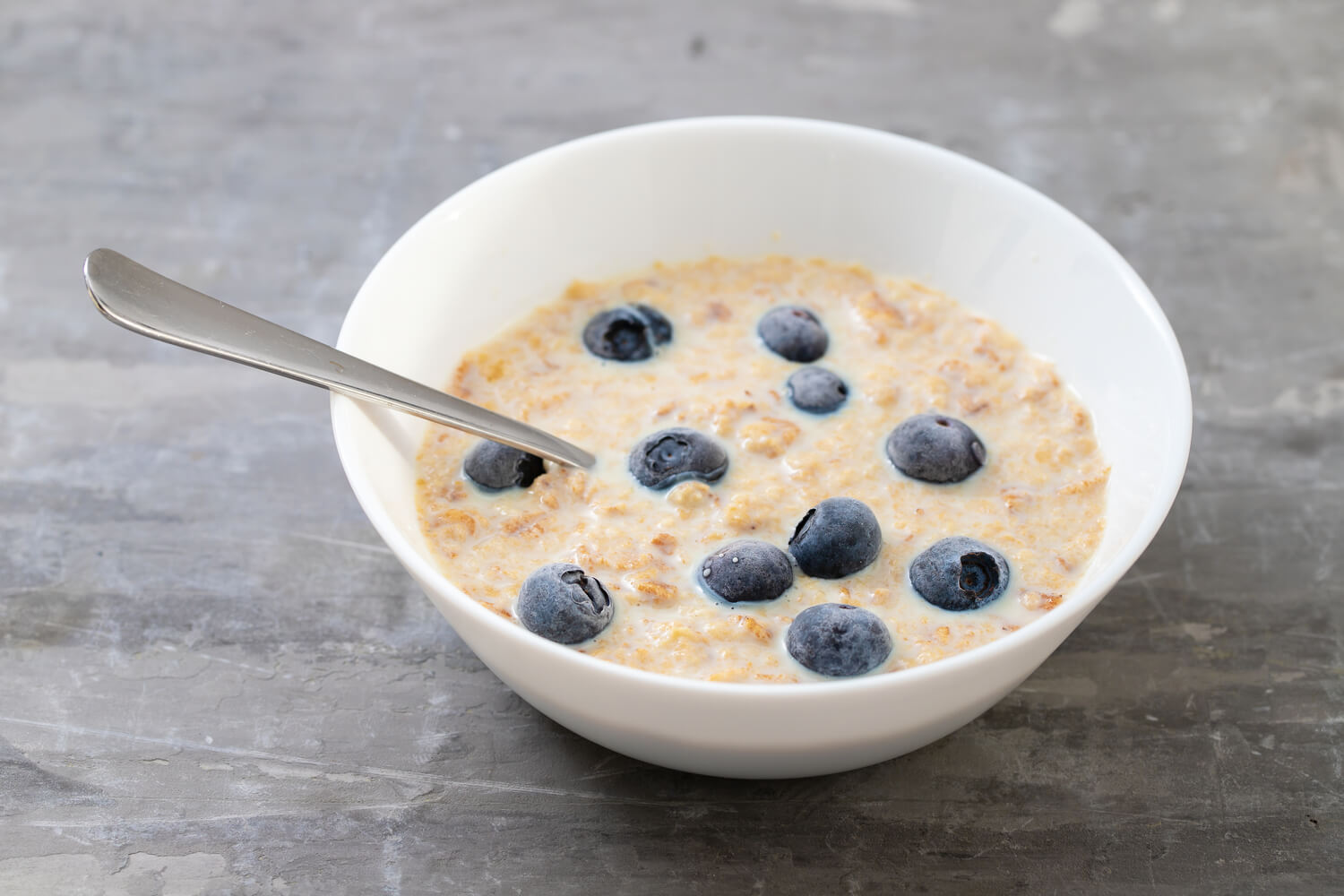 oats mixed with milk and blueberry