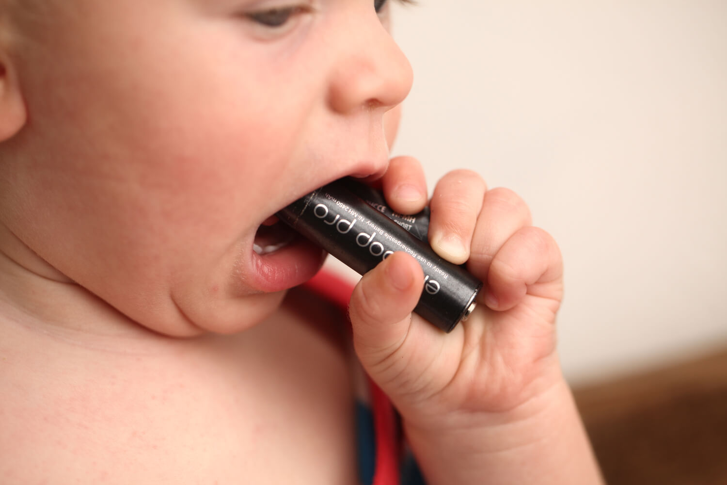 baby chewing battery