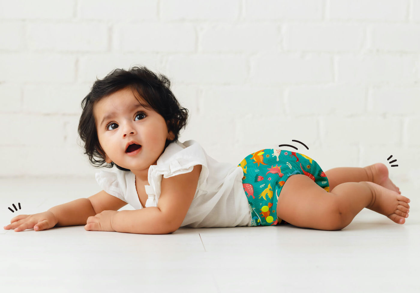 baby wearing cloth diaper