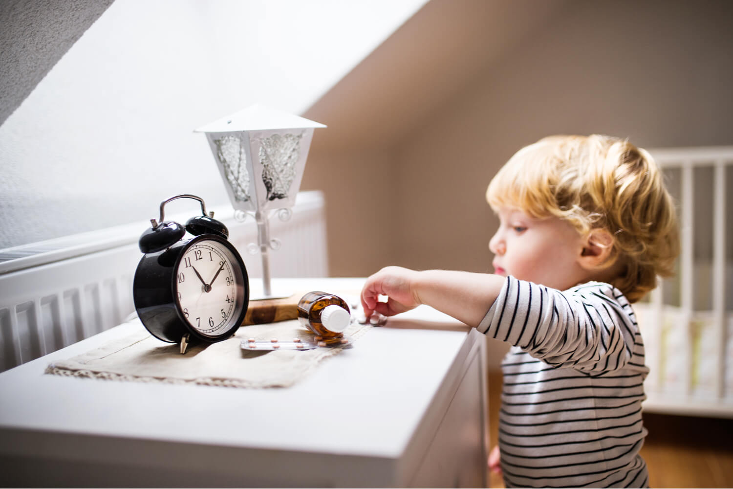kid reaching medicine