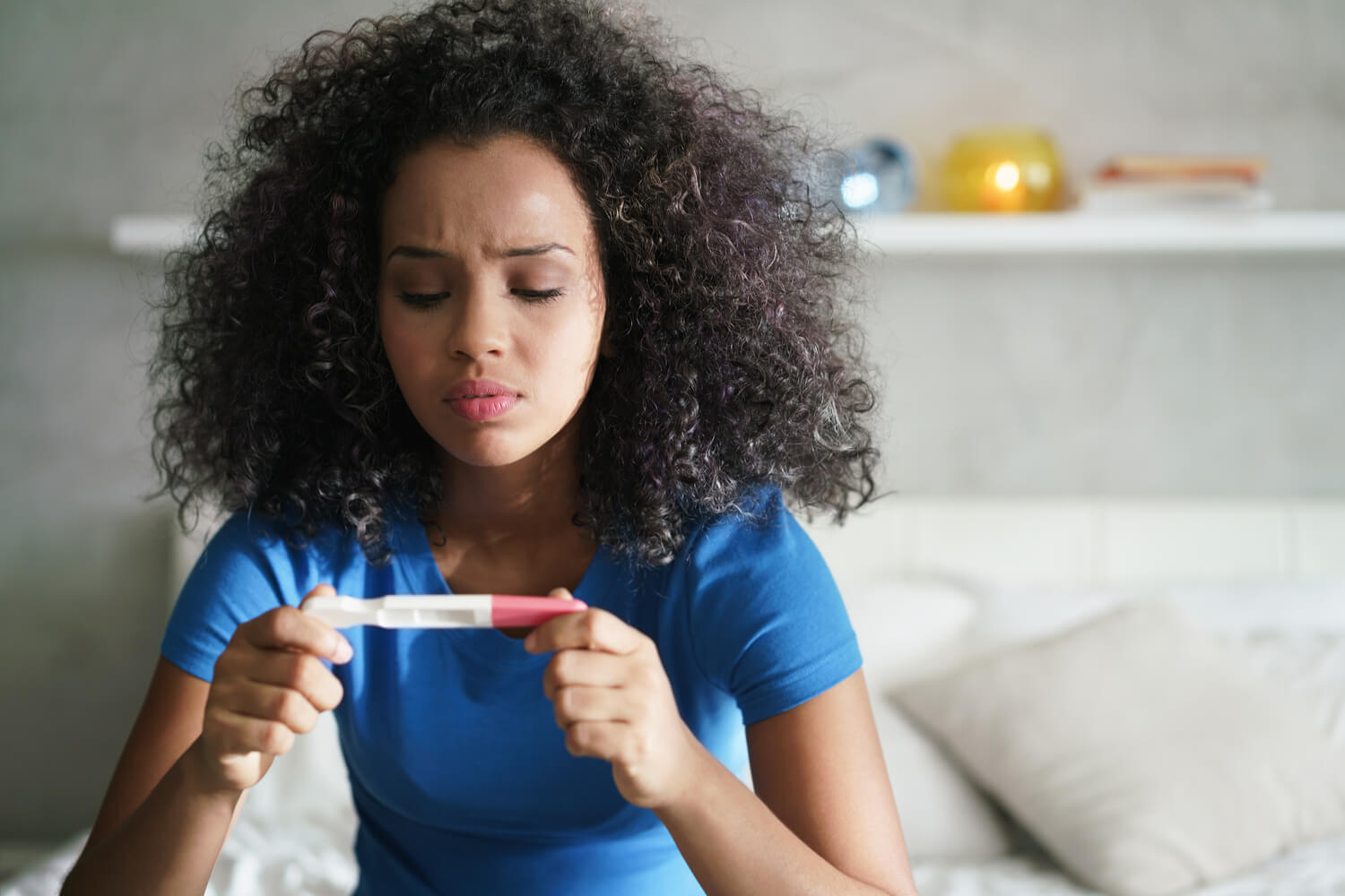 women checking pregnancy test