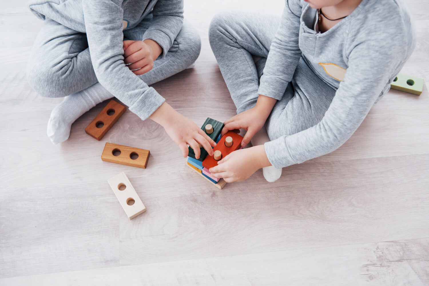 kids sitting Criss-Cross position