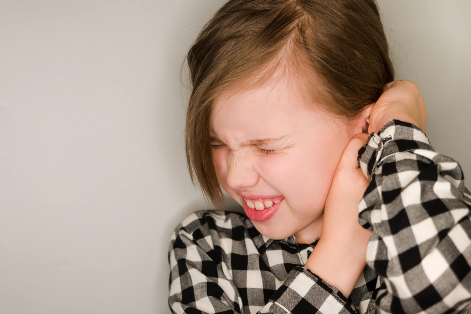 girl with ear pain 