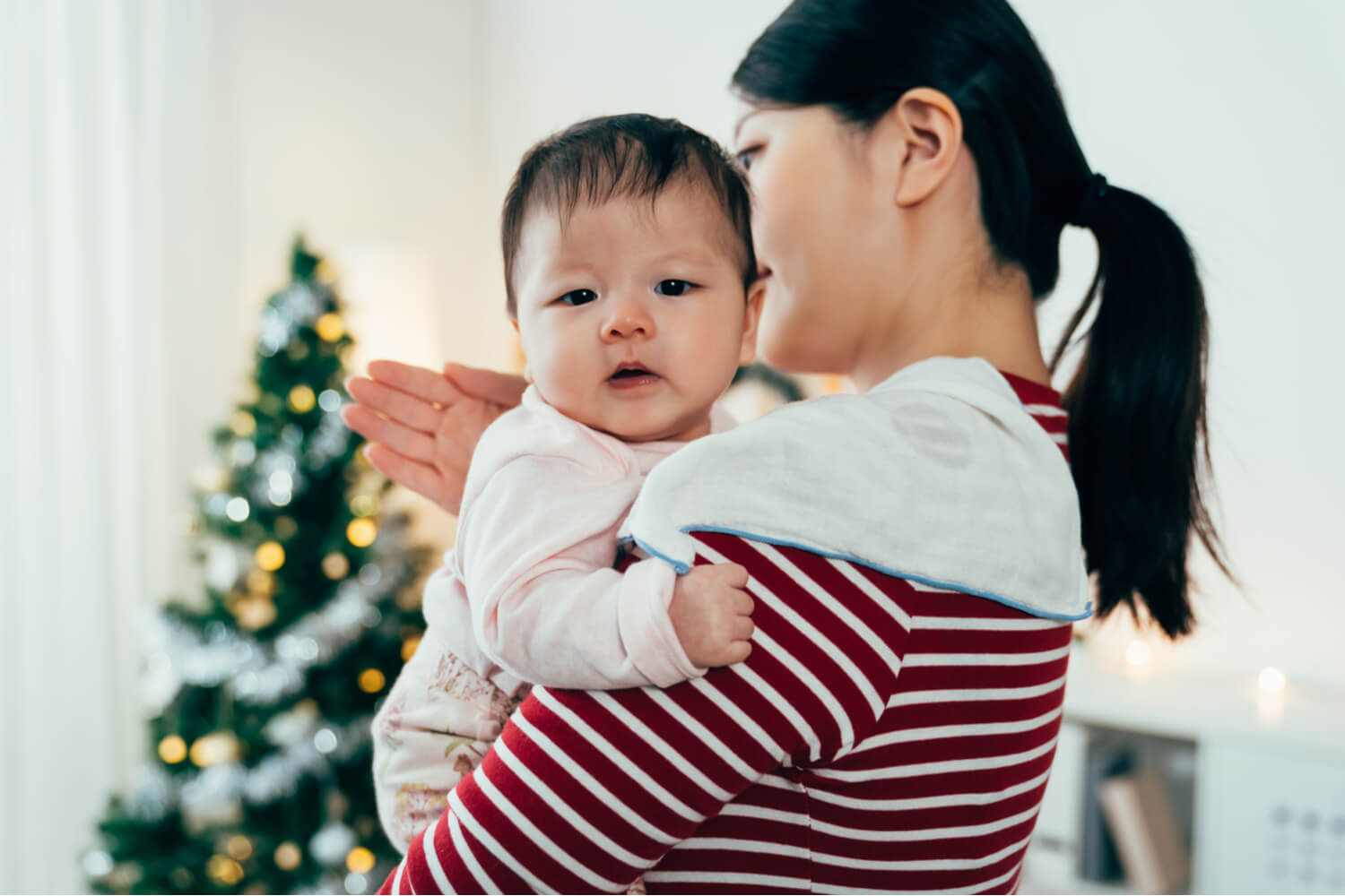 mom burping her baby -colic relief