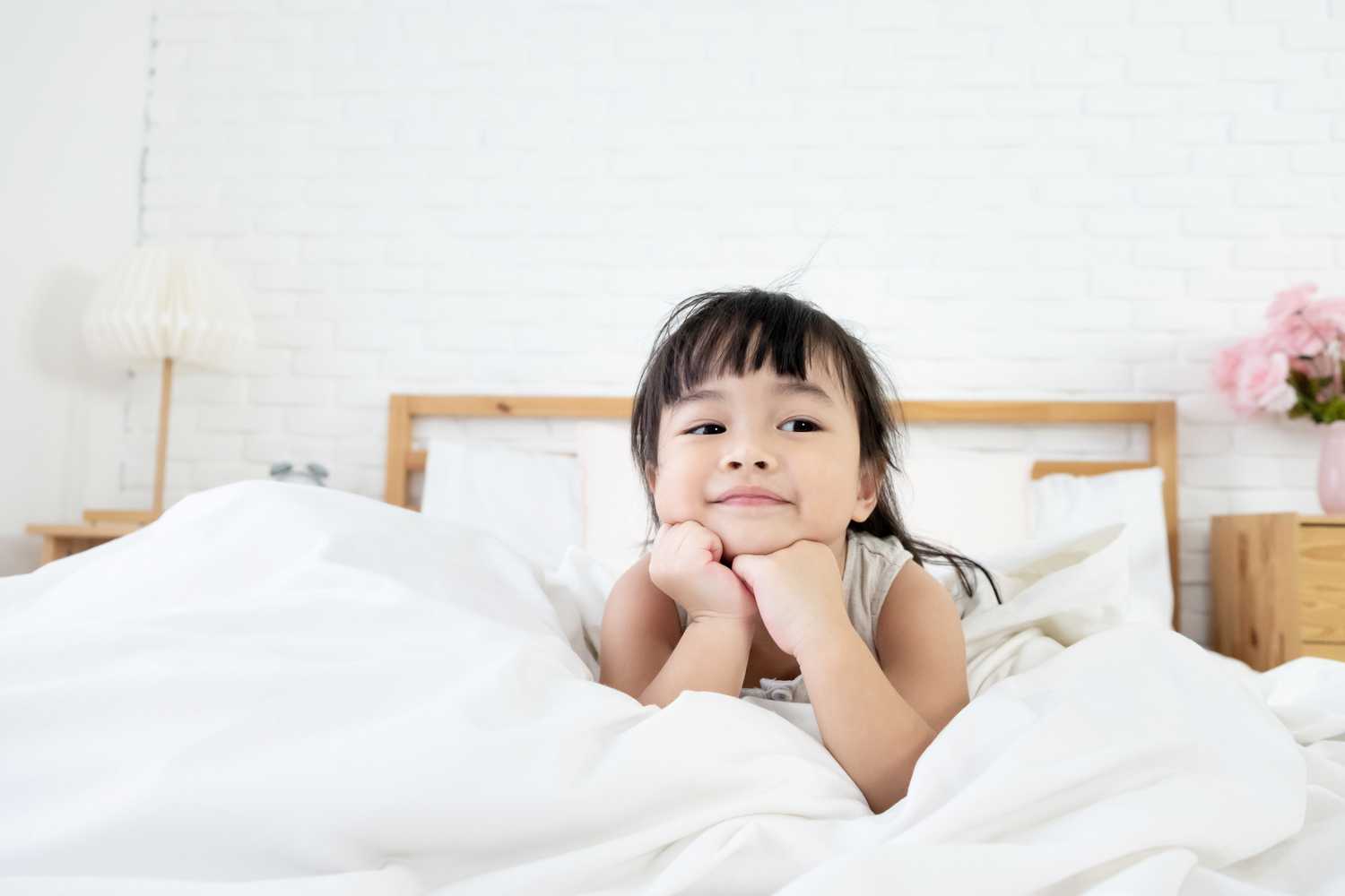 Toddler on Bed