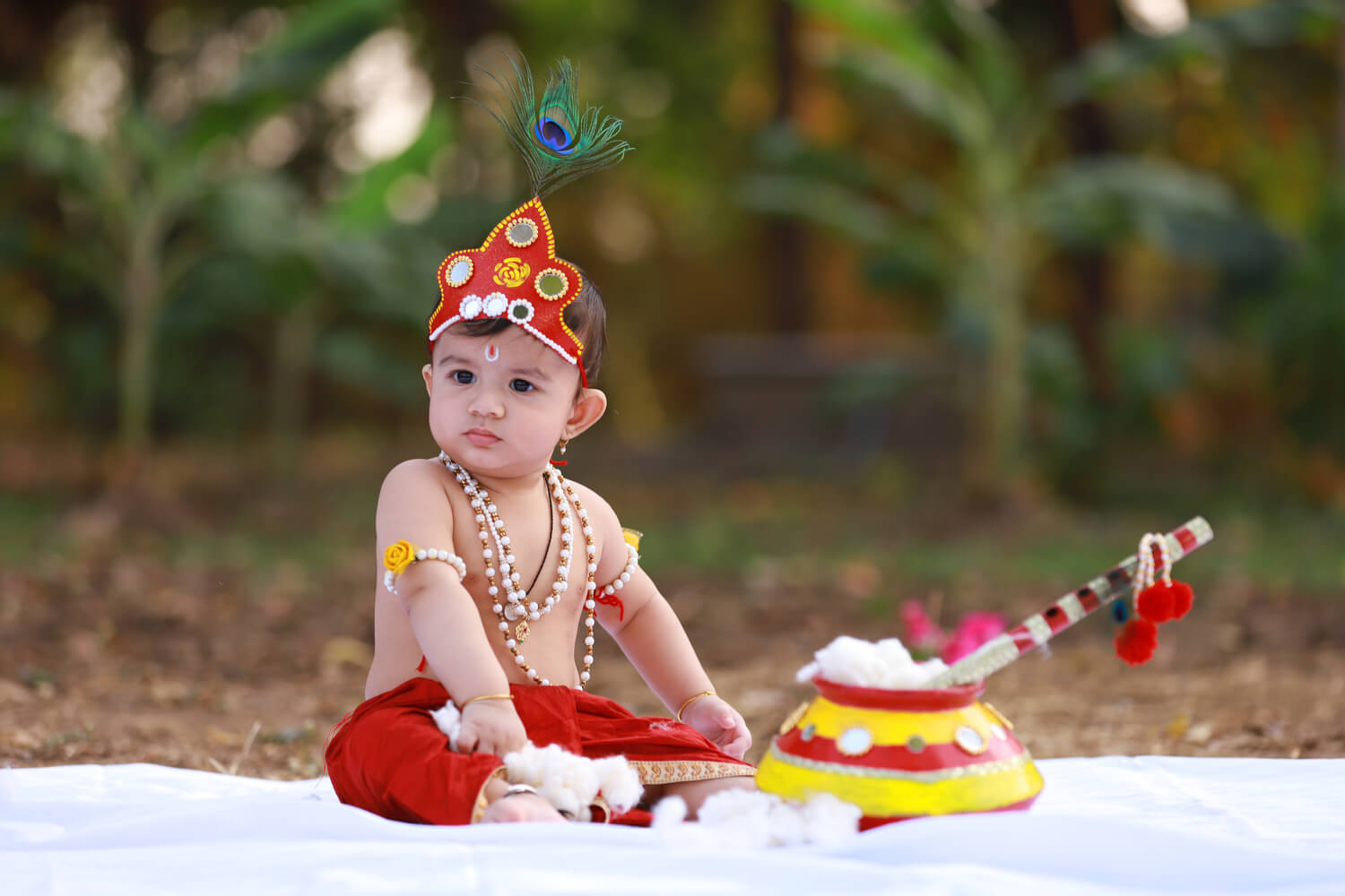 baby boy dressed as Krishna