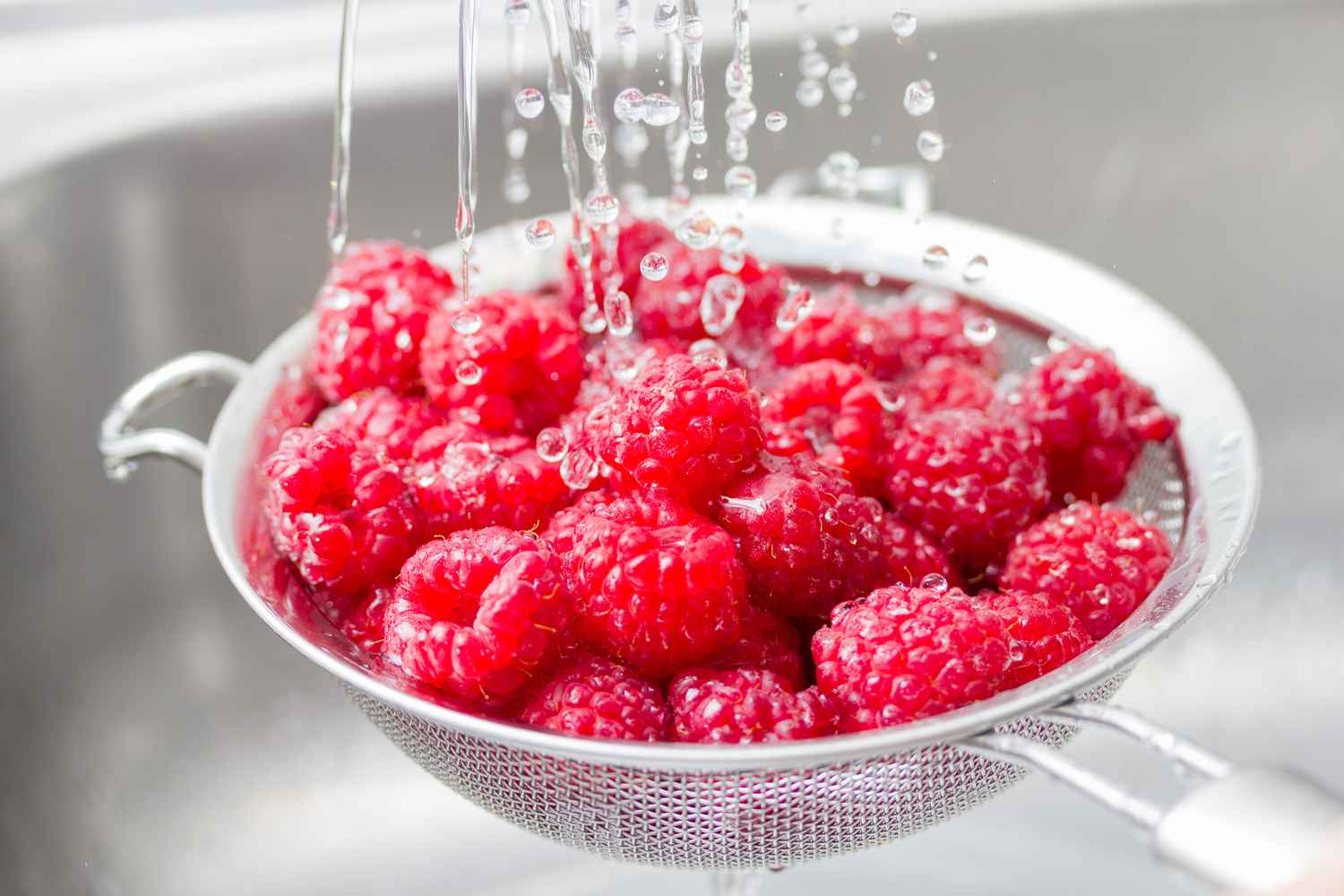 washing raspberries