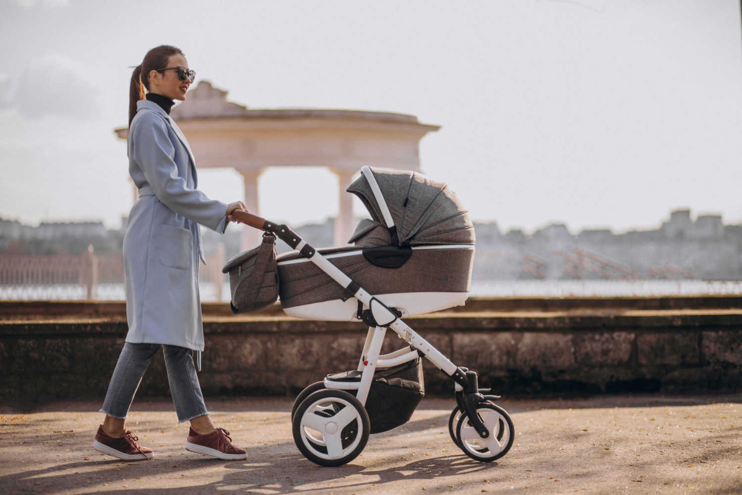 mom taking baby on stroller for walk