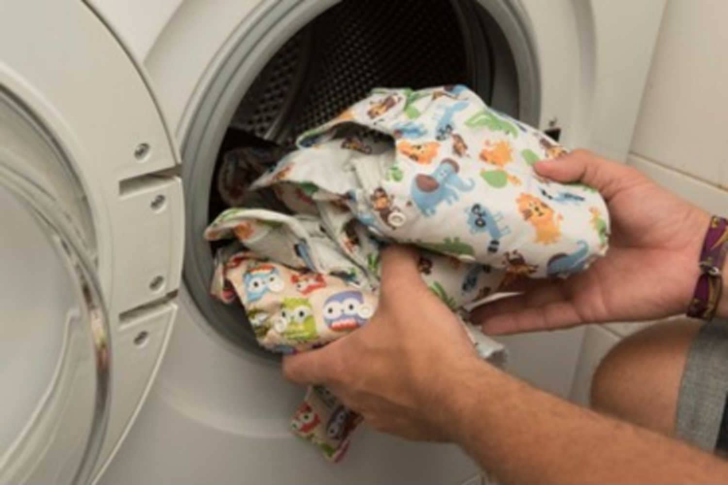 Washing Cloth Diapers In The Machine Being The Parent