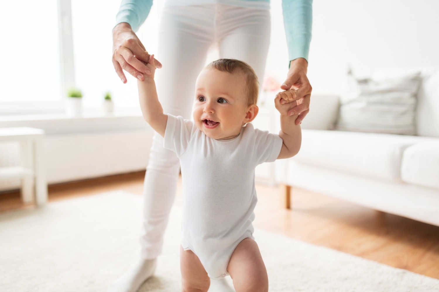 Help a Baby Reach Their 9 Month Milestone