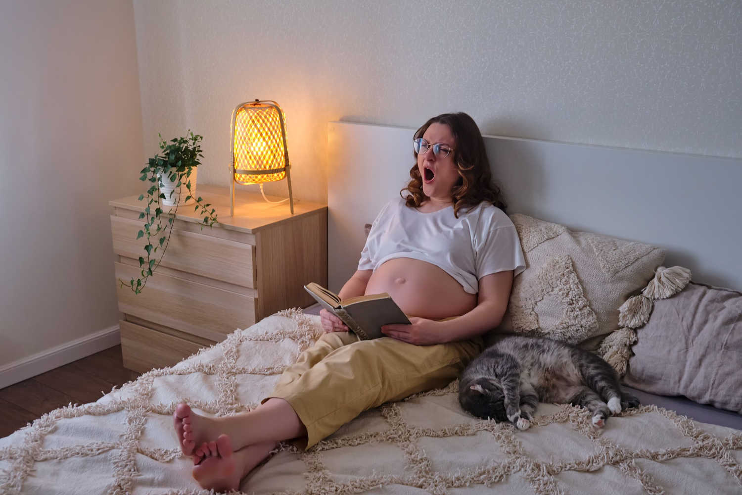women yawning when reading