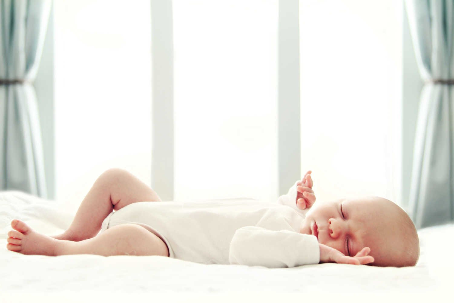 baby sleeping on back