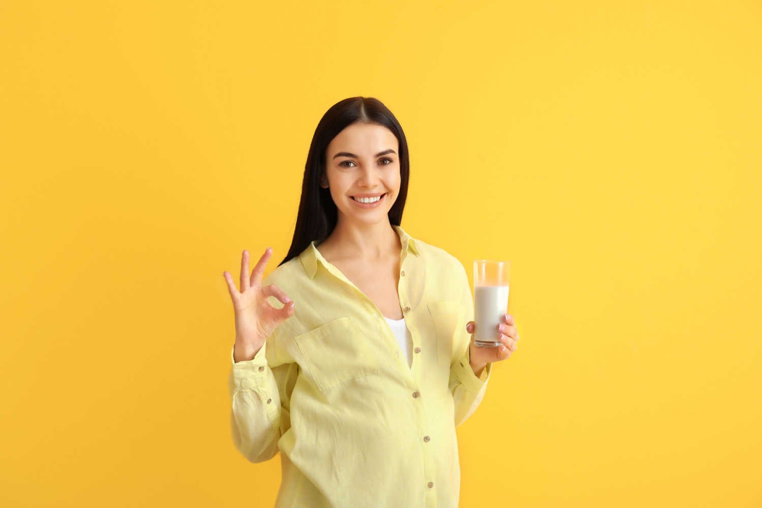 woman enjoying nutritional drink during pregnancy