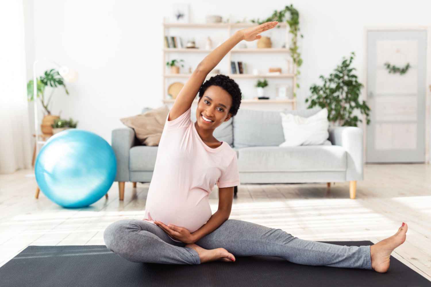 pregnant woman exercising to avoid veiny breasts