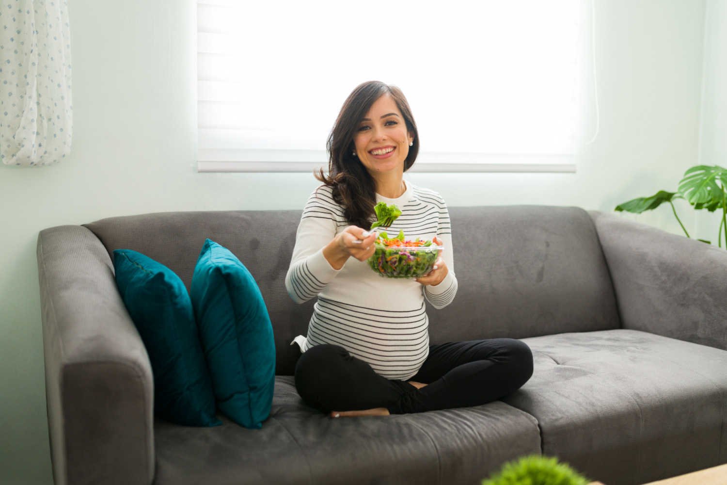 pregnant woman eating healthy food