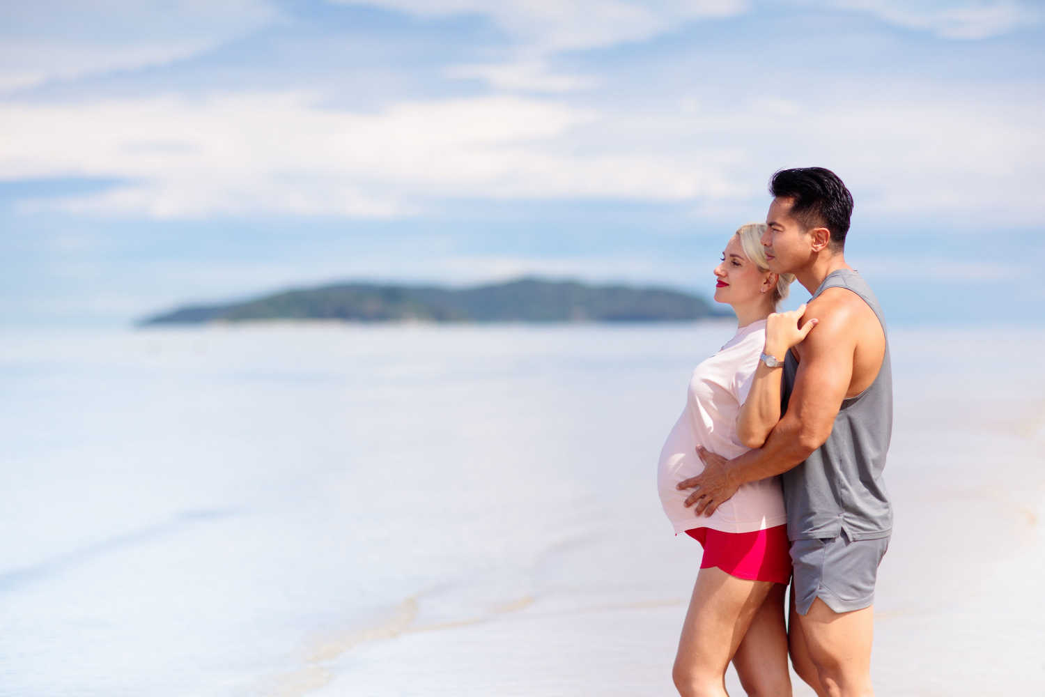 couple standing in a beach